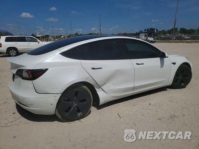 Trzecie zdjęcie samochodu z tyłu: 2021 TESLA MODEL 3 VIN:5YJ3E1EA2MF096114 - miniatura
