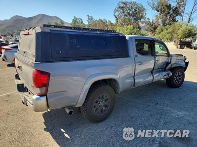 Trzecie zdjęcie samochodu z tyłu: 2021 TOYOTA TACOMA SR5 V6 VIN:3TMDZ5BN1MM116775 - miniatura
