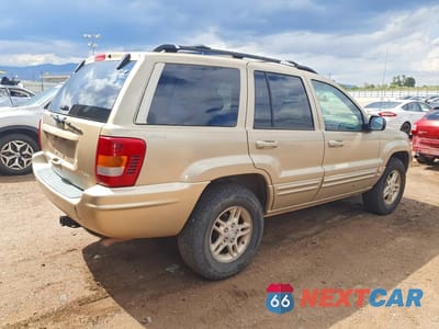 Trzecie zdjęcie samochodu z tyłu: 1999 JEEP GRAND CHEROKEE LIMITED VIN:1J4GW68NXXC696921 - miniatura