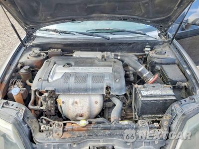 Zdjęcie 11 z 12 samochodu: 2006 HYUNDAI TIBURON GS VIN:KMHHM65D46U210961 - miniatura
