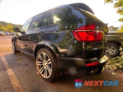 Trzecie zdjęcie samochodu z tyłu: 2013 BMW X5 XDRIVE50I VIN:5UXZV8C50D0C14959 - miniatura