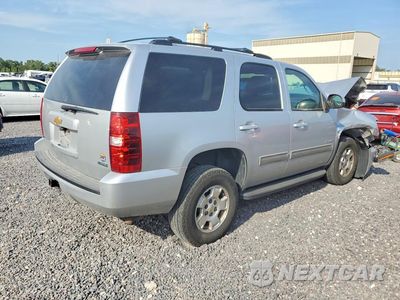Trzecie zdjęcie samochodu z tyłu: 2012 CHEVROLET TAHOE K1500 LS VIN:1GNSKAE02CR169185 - miniatura