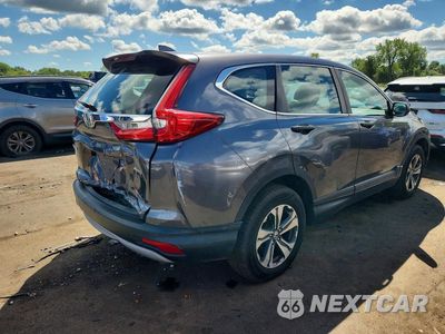 Trzecie zdjęcie samochodu z tyłu: 2017 HONDA CR-V LX VIN:2HKRW6H32HH214302 - miniatura