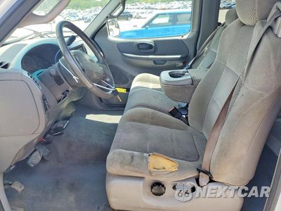 Zdjęcie 7 z 12 samochodu: 2001 FORD F150 VIN:1FTRX18L61NC03504 - miniatura