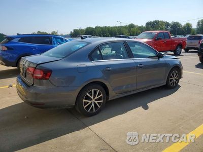 Trzecie zdjęcie samochodu z tyłu: 2017 VOLKSWAGEN JETTA SE VIN:3VWB67AJ6HM245124 - miniatura