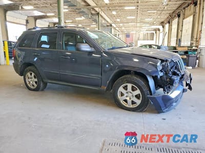 Czwarte zdjęcie samochodu z boku: 2009 JEEP GRAND CHEROKEE LAREDO VIN:1J8GR48K29C512316 - miniatura