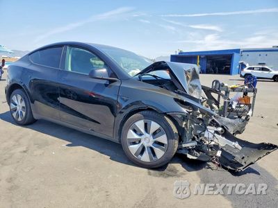 Czwarte zdjęcie samochodu z boku: 2023 TESLA MODEL Y VIN:7SAYGDEE8PA162545 - miniatura