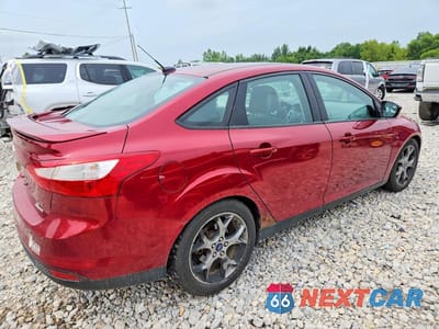 Trzecie zdjęcie samochodu z tyłu: 2014 FORD FOCUS SE VIN:1FADP3F21EL281003 - miniatura
