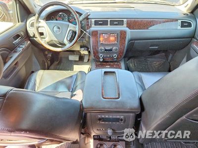 Zdjęcie 8 z 13 samochodu: 2011 GMC YUKON XL DENALI VIN:1GKS2MEF5BR324071 - miniatura