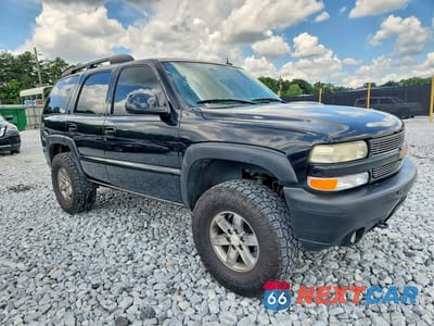 Czwarte zdjęcie samochodu z boku: 2004 CHEVROLET TAHOE K1500 VIN:1GNEK13Z64R145004 - miniatura