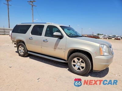 Czwarte zdjęcie samochodu z boku: 2007 GMC YUKON XL DENALI VIN:1GKFK66877J352408 - miniatura