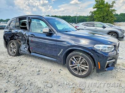Czwarte zdjęcie samochodu z boku: 2020 BMW X3 XDRIVEM40I VIN:5UXTY9C01L9C63072 - miniatura
