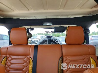 Zdjęcie 10 z 13 samochodu: 2011 JEEP WRANGLER UNLIMITED SAHARA VIN:1J4HA5H1XBL572490 - miniatura