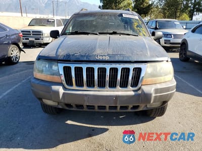 Piąte zdjęcie samochodu w środku: 2001 JEEP GRAND CHEROKEE LAREDO VIN:1J4GX48S21C702810 - miniatura