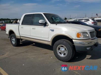Czwarte zdjęcie samochodu z boku: 2001 FORD F150 SUPERCREW VIN:1FTRW08W31KD71951 - miniatura