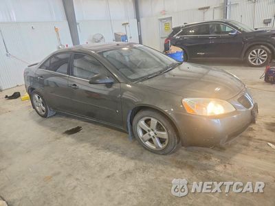Czwarte zdjęcie samochodu z boku: 2006 PONTIAC G6 GT VIN:1G2ZH558264129987 - miniatura