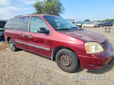 Czwarte zdjęcie samochodu z boku: 2007 FORD FREESTAR SE VIN:2FMZA51677BA12526 - miniatura