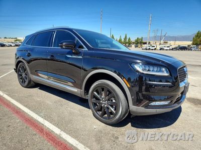 Czwarte zdjęcie samochodu z boku: 2023 LINCOLN NAUTILUS RESERVE VIN:2LMPJ8KP6PBL10585 - miniatura