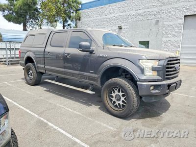 Czwarte zdjęcie samochodu z boku: 2015 FORD F150 SUPERCREW VIN:1FTFW1EG7FFA88684 - miniatura
