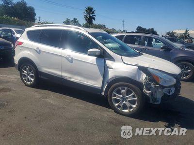 Czwarte zdjęcie samochodu z boku: 2016 FORD ESCAPE TITANIUM VIN:1FMCU0J99GUC00291 - miniatura