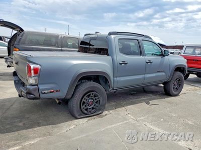 Trzecie zdjęcie samochodu z tyłu: 2021 TOYOTA TACOMA TRD OFF-ROAD VIN:3TMCZ5AN6MM387859 - miniatura