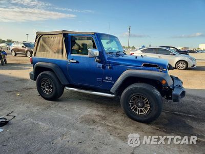 Czwarte zdjęcie samochodu z boku: 2009 JEEP WRANGLER X VIN:1J4FA24159L784011 - miniatura