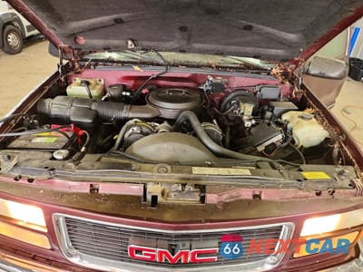 Zdjęcie 12 z 13 samochodu: 1995 GMC YUKON VIN:1GKEK18K0SJ743870 - miniatura