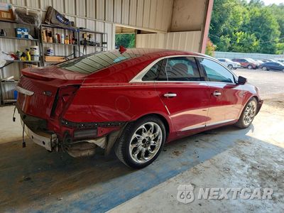 Trzecie zdjęcie samochodu z tyłu: 2013 CADILLAC XTS PREMIUM COLLECTION VIN:2G61S5S34D9111085 - miniatura