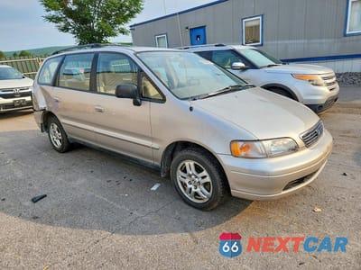 Czwarte zdjęcie samochodu z boku: 1995 HONDA ODYSSEY EX VIN:JHMRA1877SC016059 - miniatura