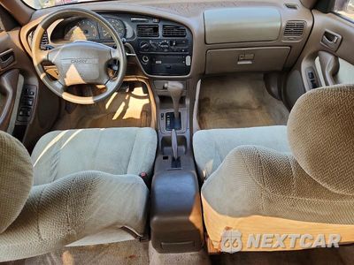 Zdjęcie 8 z 12 samochodu: 1994 TOYOTA CAMRY LE VIN:4T1SK12E5RU445837 - miniatura