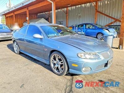 Czwarte zdjęcie samochodu z boku: 2005 PONTIAC GTO VIN:6G2VX12U05L365847 - miniatura