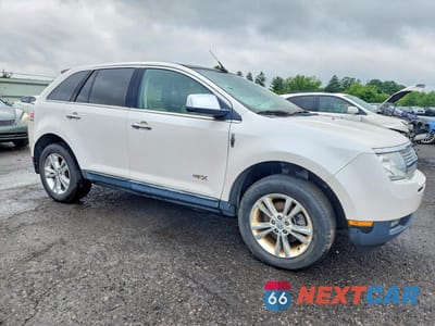 Czwarte zdjęcie samochodu z boku: 2010 LINCOLN MKX VIN:2LMDJ8JC5ABJ23413 - miniatura