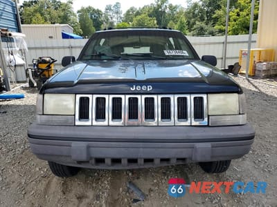 Piąte zdjęcie samochodu w środku: 1994 JEEP GRAND CHEROKEE LAREDO VIN:1J4FX58S7RC283897 - miniatura
