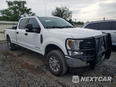 Czwarte zdjęcie samochodu z boku: 2019 FORD F350 SUPER DUTY VIN:1FT8W3BT1KED19276 - miniatura