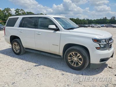 Czwarte zdjęcie samochodu z boku: 2019 CHEVROLET TAHOE C1500 LS VIN:1GNSCAKC4KR173376 - miniatura