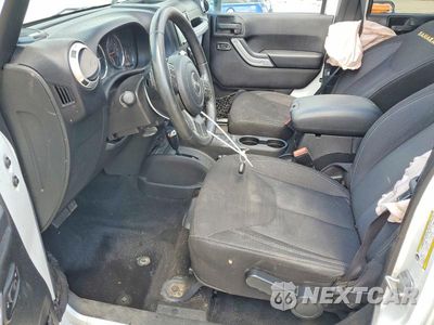 Zdjęcie 7 z 13 samochodu: 2015 JEEP WRANGLER UNLIMITED SAHARA VIN:1C4HJWEGXFL567204 - miniatura