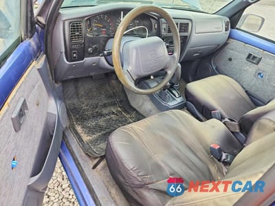 Zdjęcie 8 z 12 samochodu: 1999 TOYOTA TACOMA BASE VIN:4TAWM72N7XZ521444 - miniatura