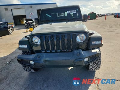 Piąte zdjęcie samochodu w środku: 2021 JEEP GLADIATOR SPORT VIN:1C6HJTAG9ML580812 - miniatura