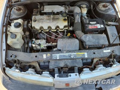 Zdjęcie 11 z 12 samochodu: 1999 SATURN SL1 VIN:1G8ZH5280XZ364676 - miniatura