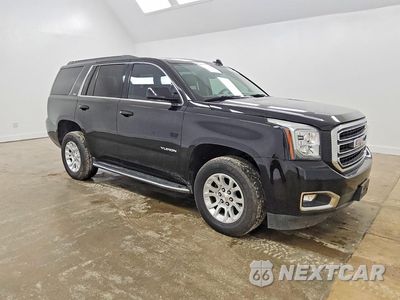 Czwarte zdjęcie samochodu z boku: 2020 GMC YUKON SLT VIN:1GKS2BKC9LR282441 - miniatura