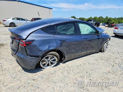 Trzecie zdjęcie samochodu z tyłu: 2022 TESLA MODEL Y VIN:7SAYGDEE4NF487712 - miniatura