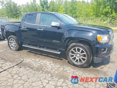 Czwarte zdjęcie samochodu z boku: 2017 GMC CANYON DENALI VIN:1GTG6EEN6H1191976 - miniatura