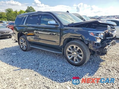 Czwarte zdjęcie samochodu z boku: 2015 CHEVROLET TAHOE K1500 LTZ VIN:1GNSKCKC3FR672464 - miniatura