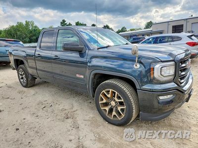 Czwarte zdjęcie samochodu z boku: 2017 GMC SIERRA K1500 SLT VIN:1GTV2NECXHZ208197 - miniatura
