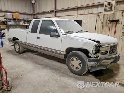 Czwarte zdjęcie samochodu z boku: 1998 GMC SIERRA C1500 VIN:1GTEC19R1WR503853 - miniatura