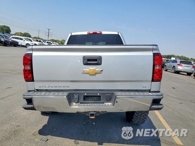 Zdjęcie 6 z 12 samochodu: 2018 CHEVROLET SILVERADO K1500 LT VIN:3GCUKREC3JG570588 - miniatura