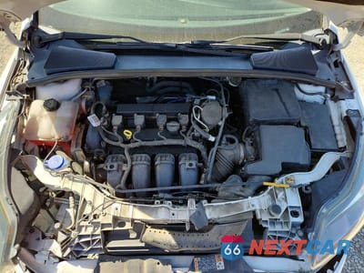 Zdjęcie 11 z 13 samochodu: 2014 FORD FOCUS TITANIUM VIN:1FADP3N21EL281729 - miniatura