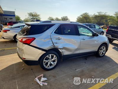 Trzecie zdjęcie samochodu z tyłu: 2020 CHEVROLET EQUINOX LT VIN:3GNAXLEX2LS718564 - miniatura