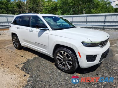 Czwarte zdjęcie samochodu z boku: 2022 JEEP GRAND CHEROKEE OVERLAND VIN:1C4RJHDG7N8540240 - miniatura