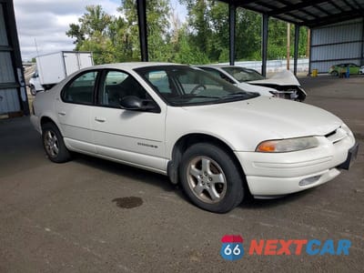 Czwarte zdjęcie samochodu z boku: 1999 DODGE STRATUS ES VIN:1B3EJ56H5XN608740 - miniatura